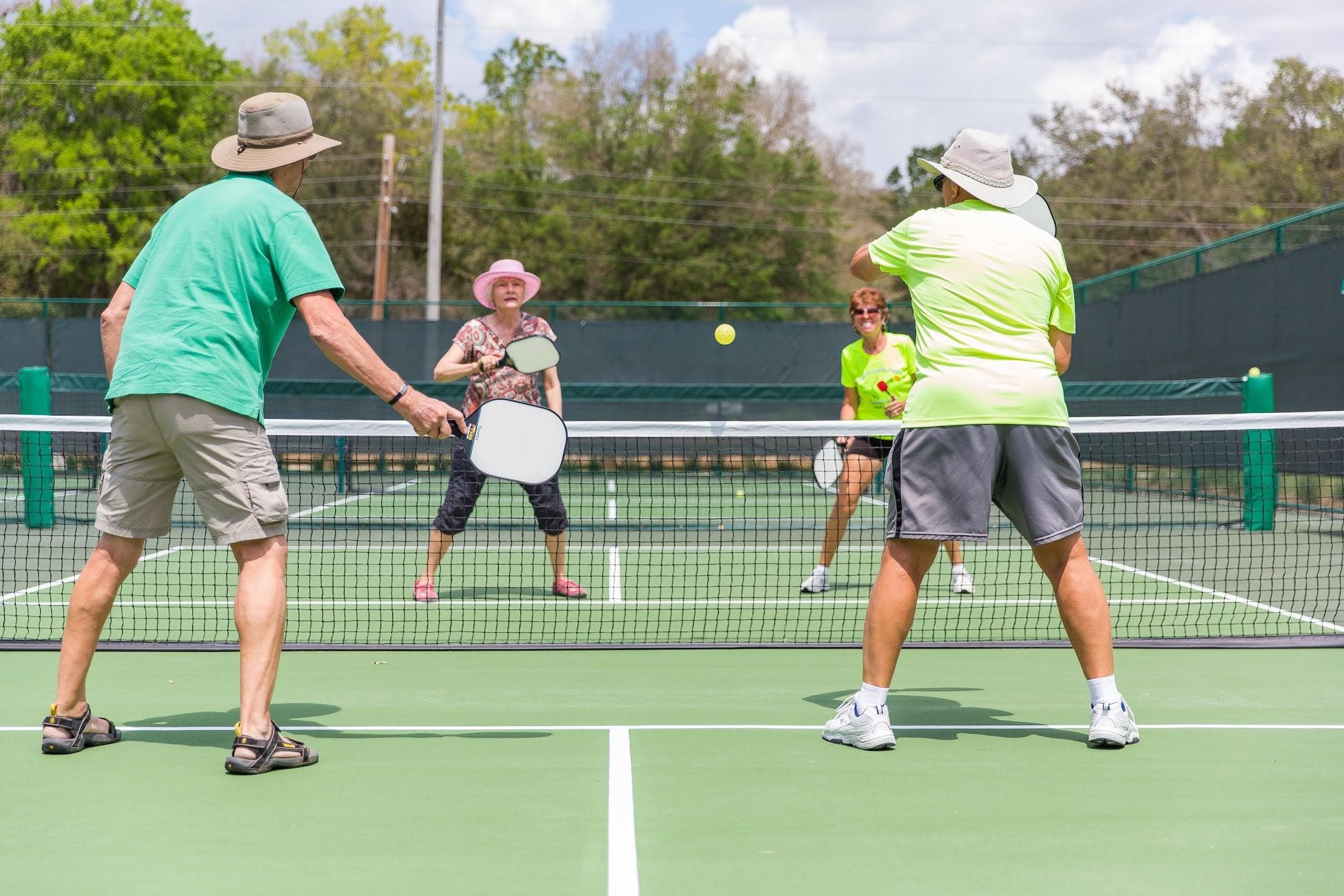 Texas pickleball players on an outdoor court