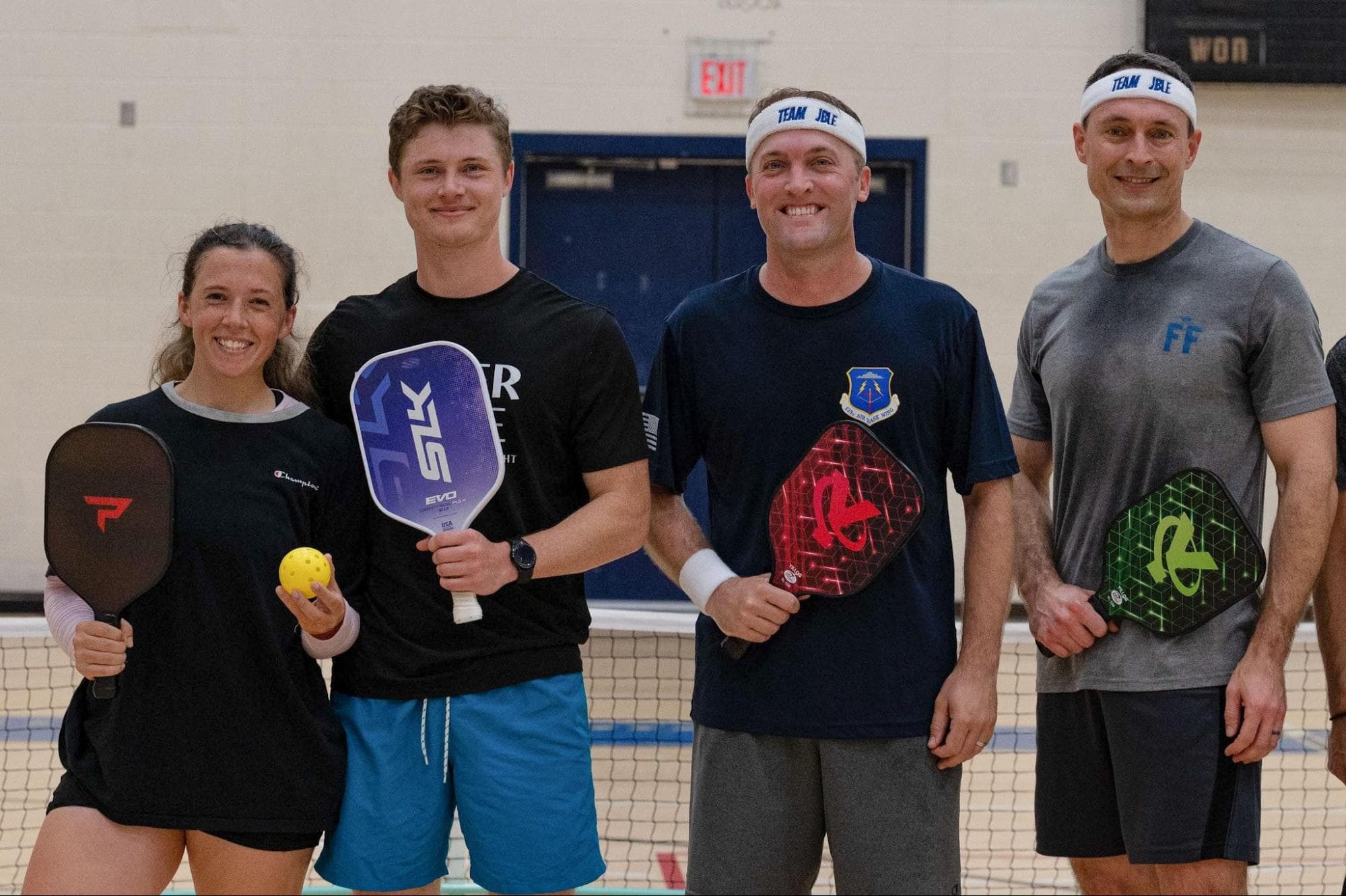 Pickleball players ready on the court